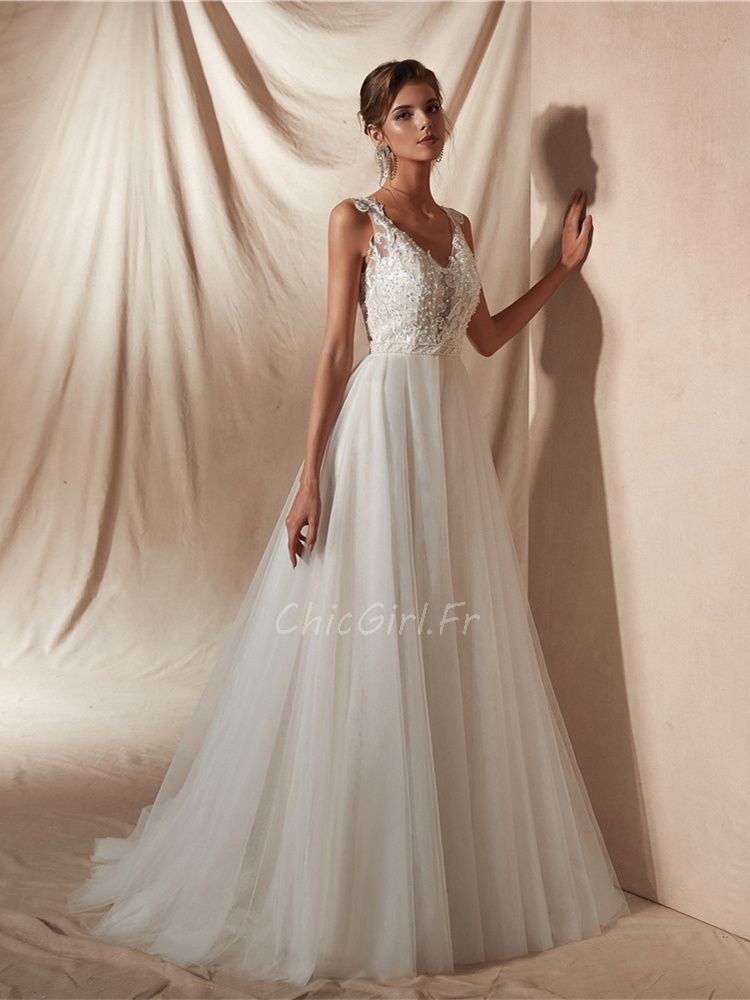 Robe de mariée dentelle bras sale