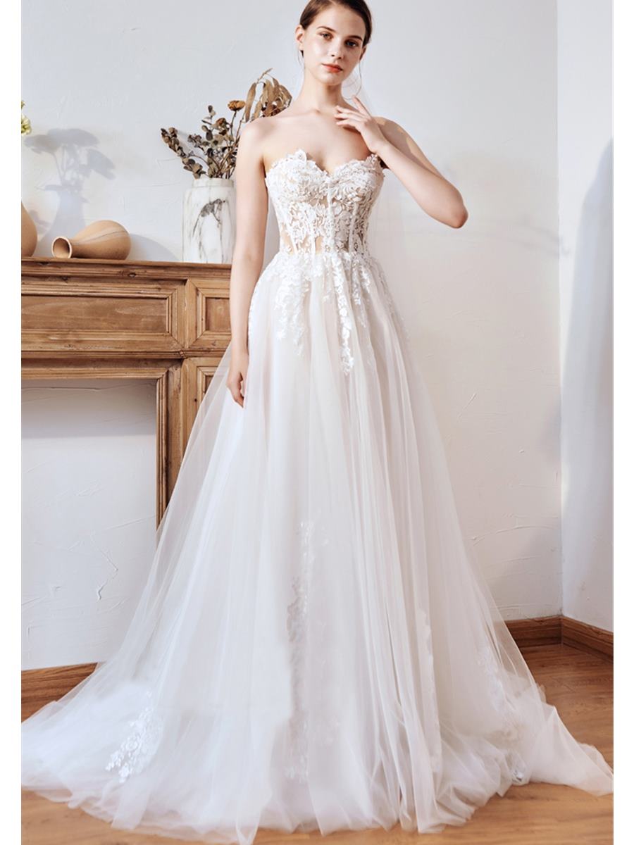 Robe de mariée bustier plume sale